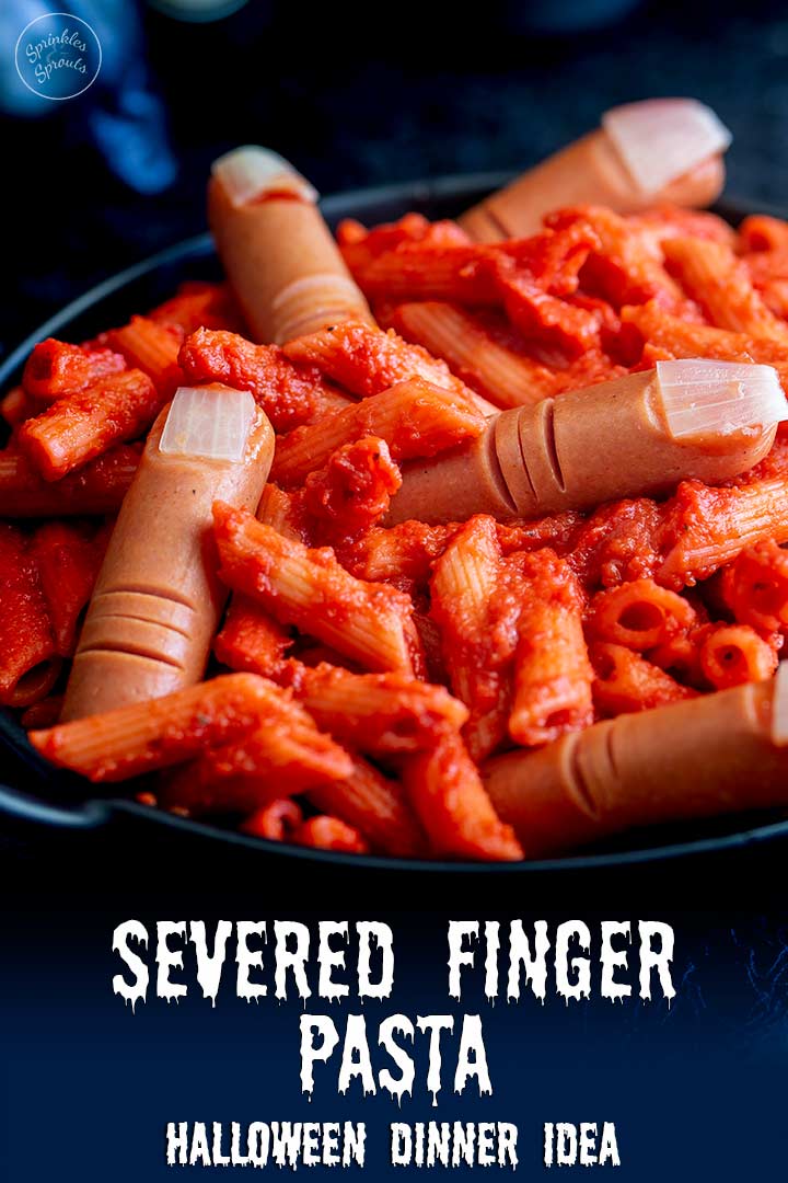 a black bowl of red pasta with hotdog fingers in it with text at the bottom