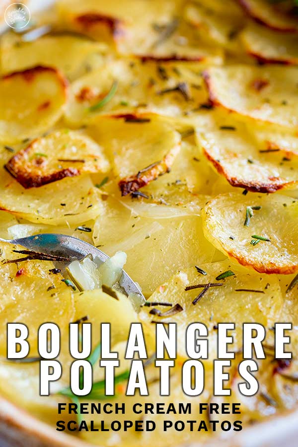 a spoon in Boulangère potatoes with text at the bottom