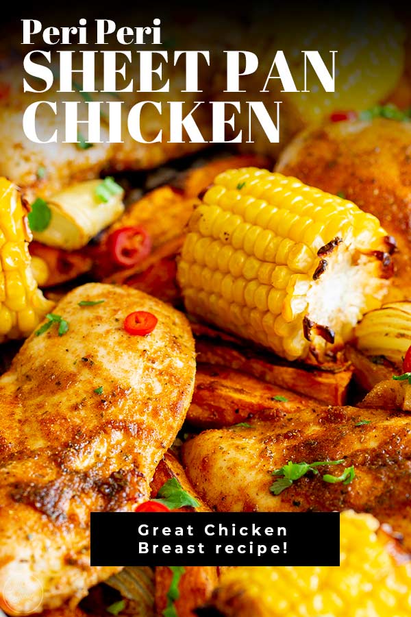 peri peri chicken on a sheet pan with veggies with text at the top and bottom
