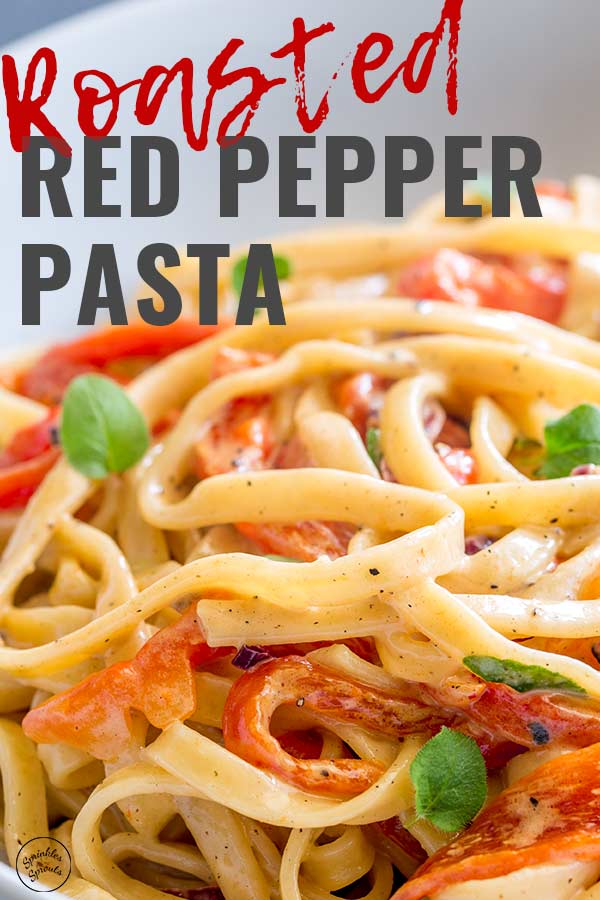 close up on roasted red pepper pasta with text at the top