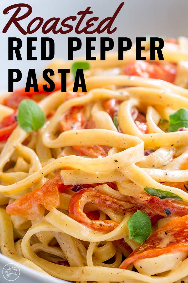 close up on roasted red pepper pasta with text at the top