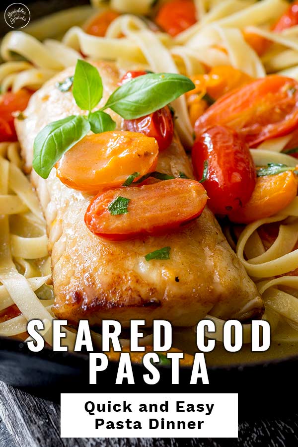cooked fillet of cod on a bed of pasta with text at the bottom