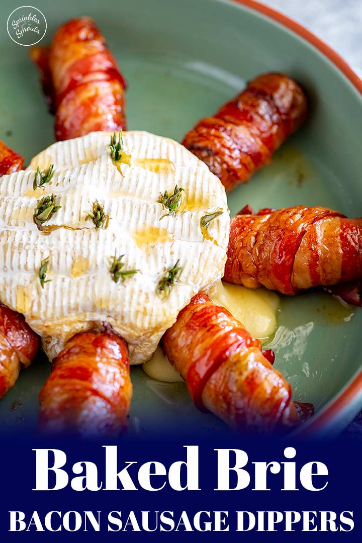 a round of brie with bacon wrapped sausages around it and text at the bottom