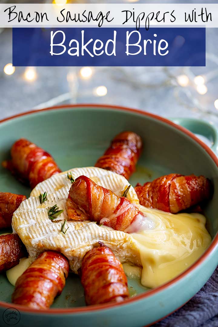 a bacon wrapped sausage sitting in melted brie with text at the top