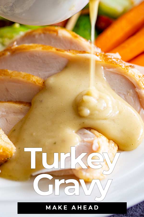 close up on gravy being poured over turkey with text at the bottom