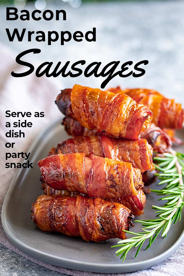 a grey oval plate piled with sausages wrapped in bacon with text at the top and side