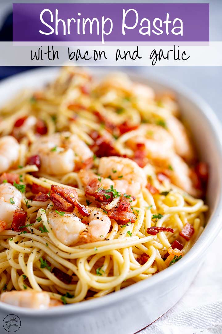 an oval dish of pasta with shrimp on top and text at the top