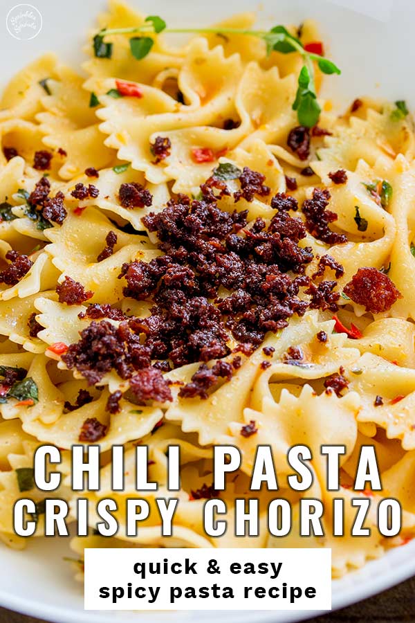 close up on the crispy chorizo on pasta with text at the bottom