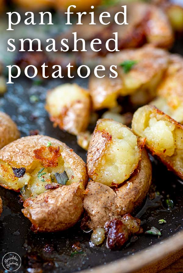 close up of fried smashed potatoes with text at the top