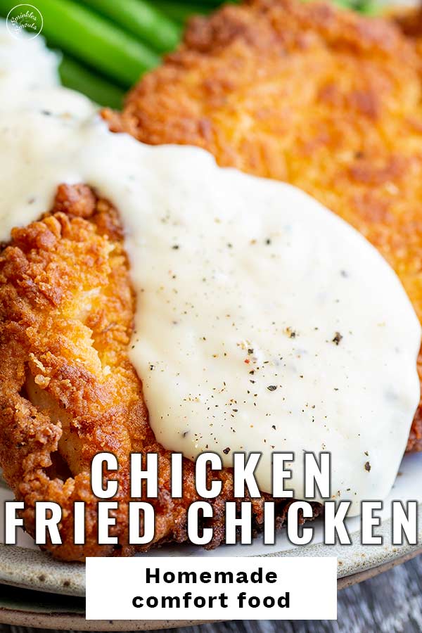 white gravy on chicken fried chicken with text at the bottom