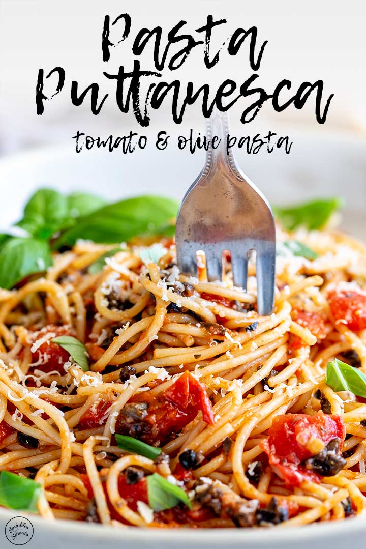 a fork swirling tomato olive spaghetti with text at the top