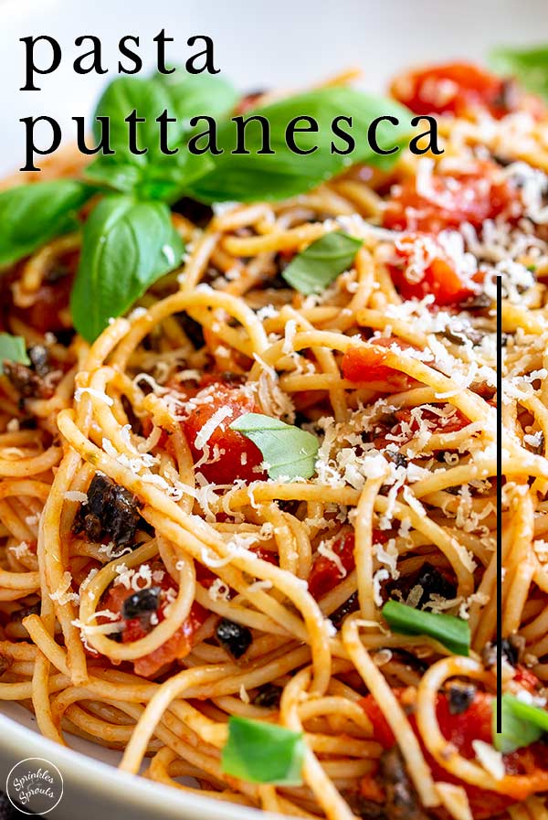 close up on pasta puttanesca with text at the top