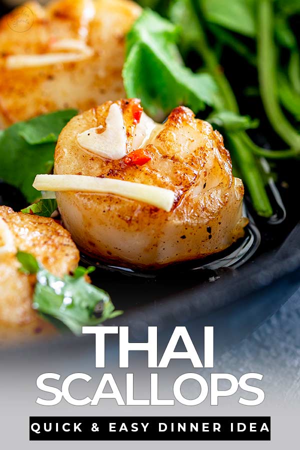close up on a seared Thai scallop with text at thebottom