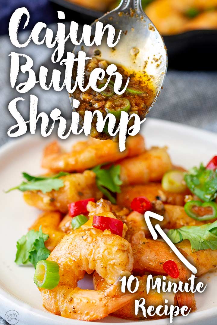 PIN IMAGE: cajun shrimp on a white plate with text in the top left and bottom right