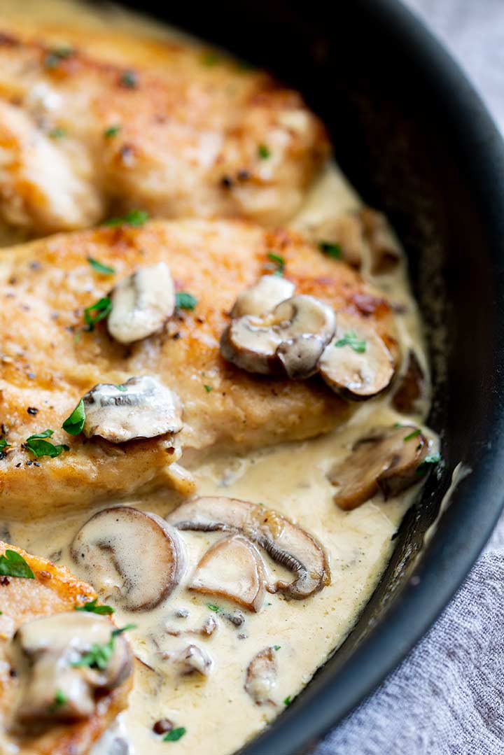 close up on mushrooms in a creamy sauce