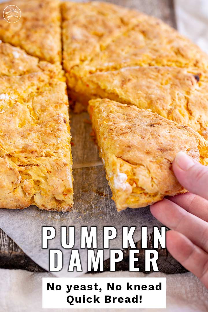 PIN IMAGE a hand picking up a slice of pumpkin bread with text at the bottom