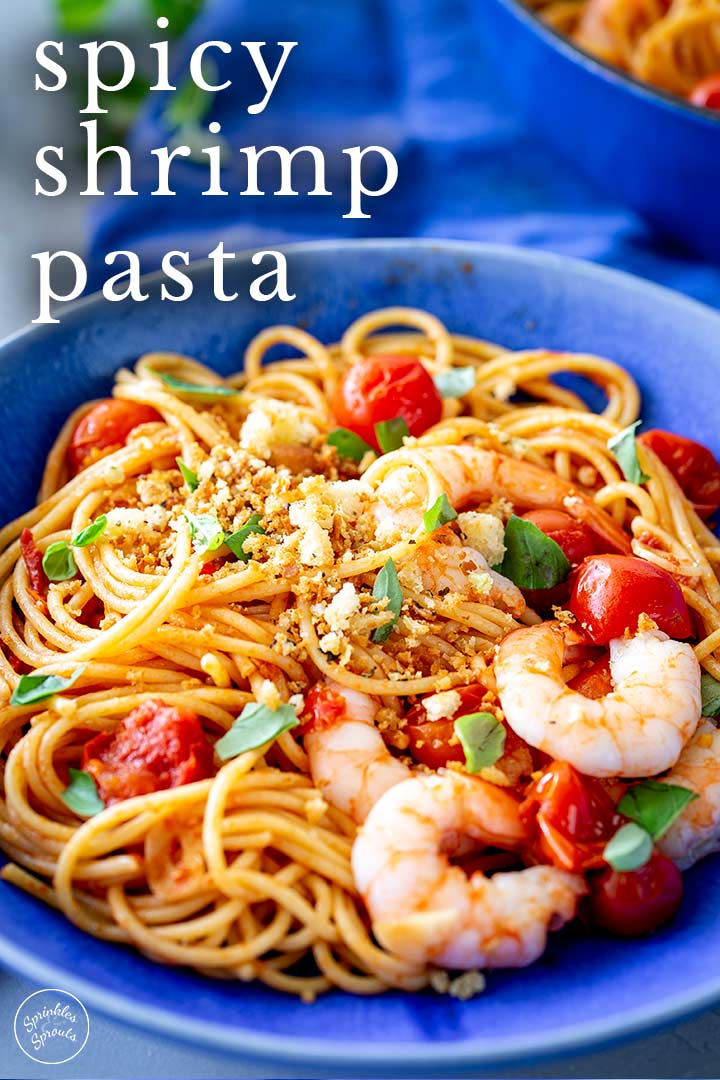 PIN IMAGE - Shrimp Pasta in a blue bowl with text overlay