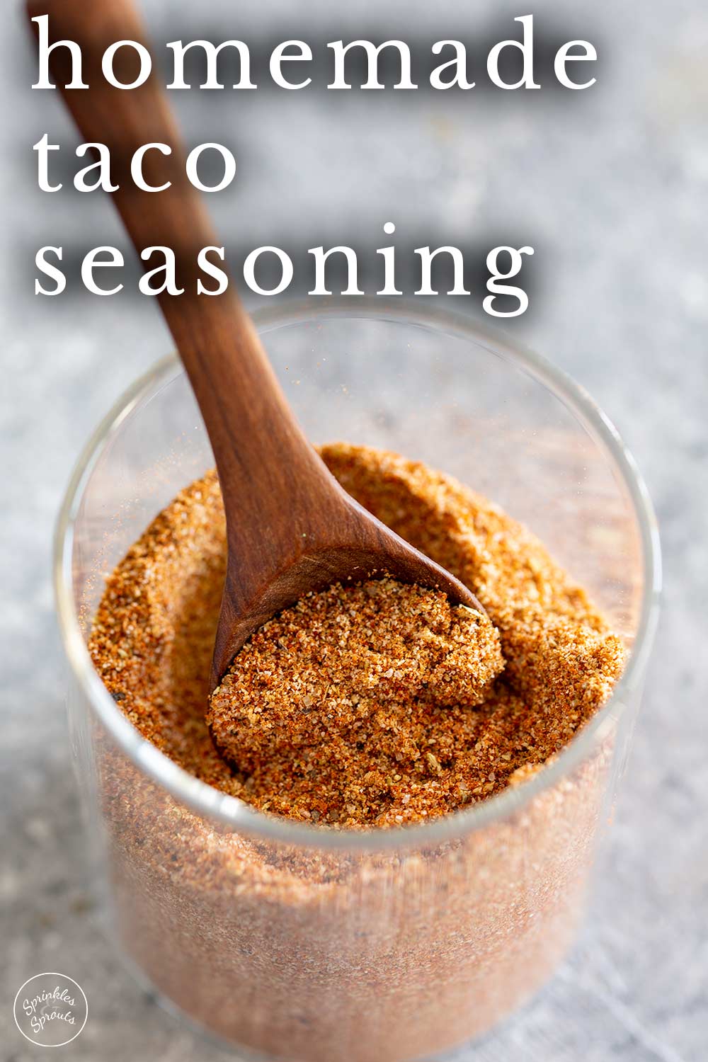 PINTEREST IMAGE - A pot of taco seasoning with text overlay