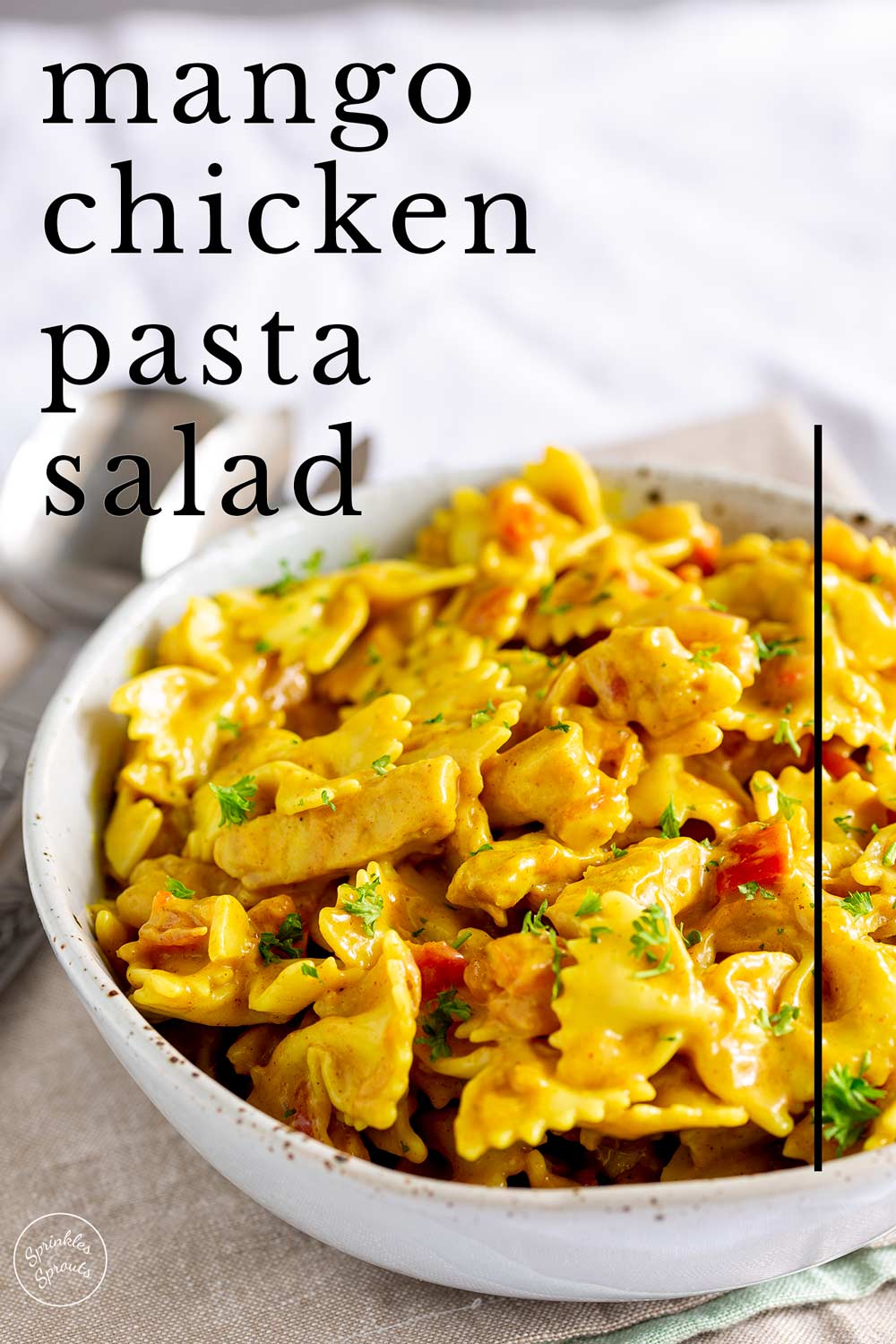 Pin image - Mango chicken pasta salad with text overlay