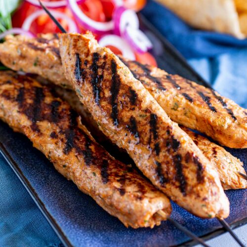 close up on the char lines on a ground chicken kebab
