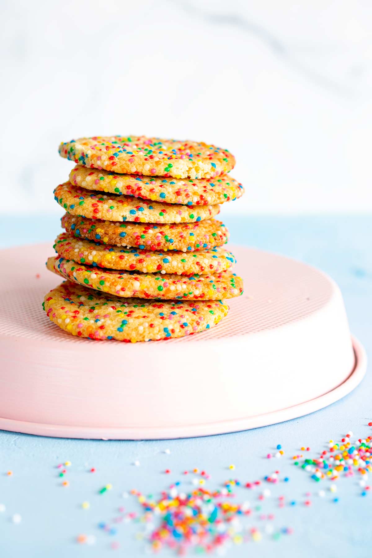 a stack of cookies on a pin cake tin