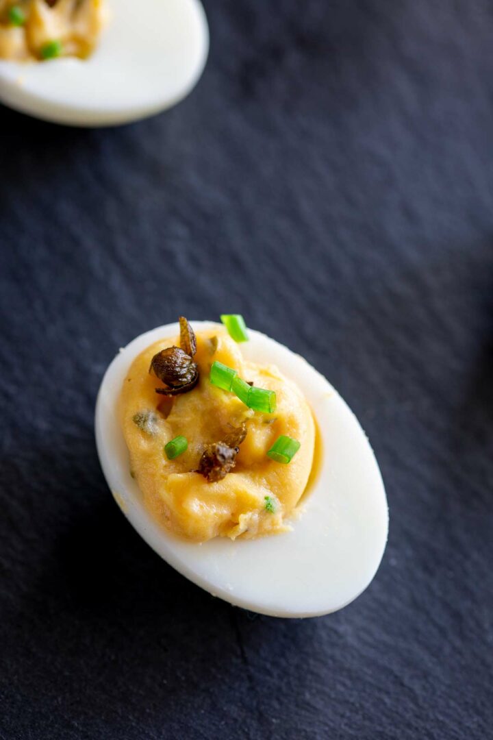 Deviled Eggs with Fried Capers Sprinkles and Sprouts