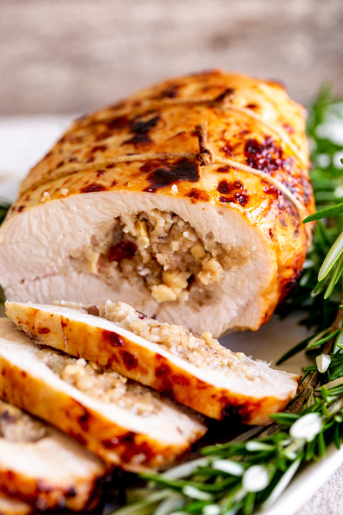close up on the apple stuffing in a turkey roulade