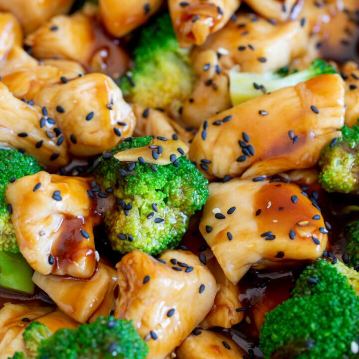 overhead of chickened broccoli with Chinese brown sauce and sesame seeds on it