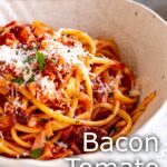 Pin image: A bowl of tomato bacon pasta on a table with text overlaid
