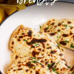 pin image: cheesy chicken breasts in a pan with text overlaid