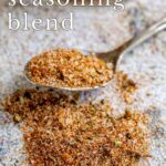 pinterest image: a spoon of Jamaican jerk seasoning with text overlay
