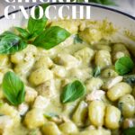 pin image: Pesto Chicken Gnocchi in a blue pan with text overlaid