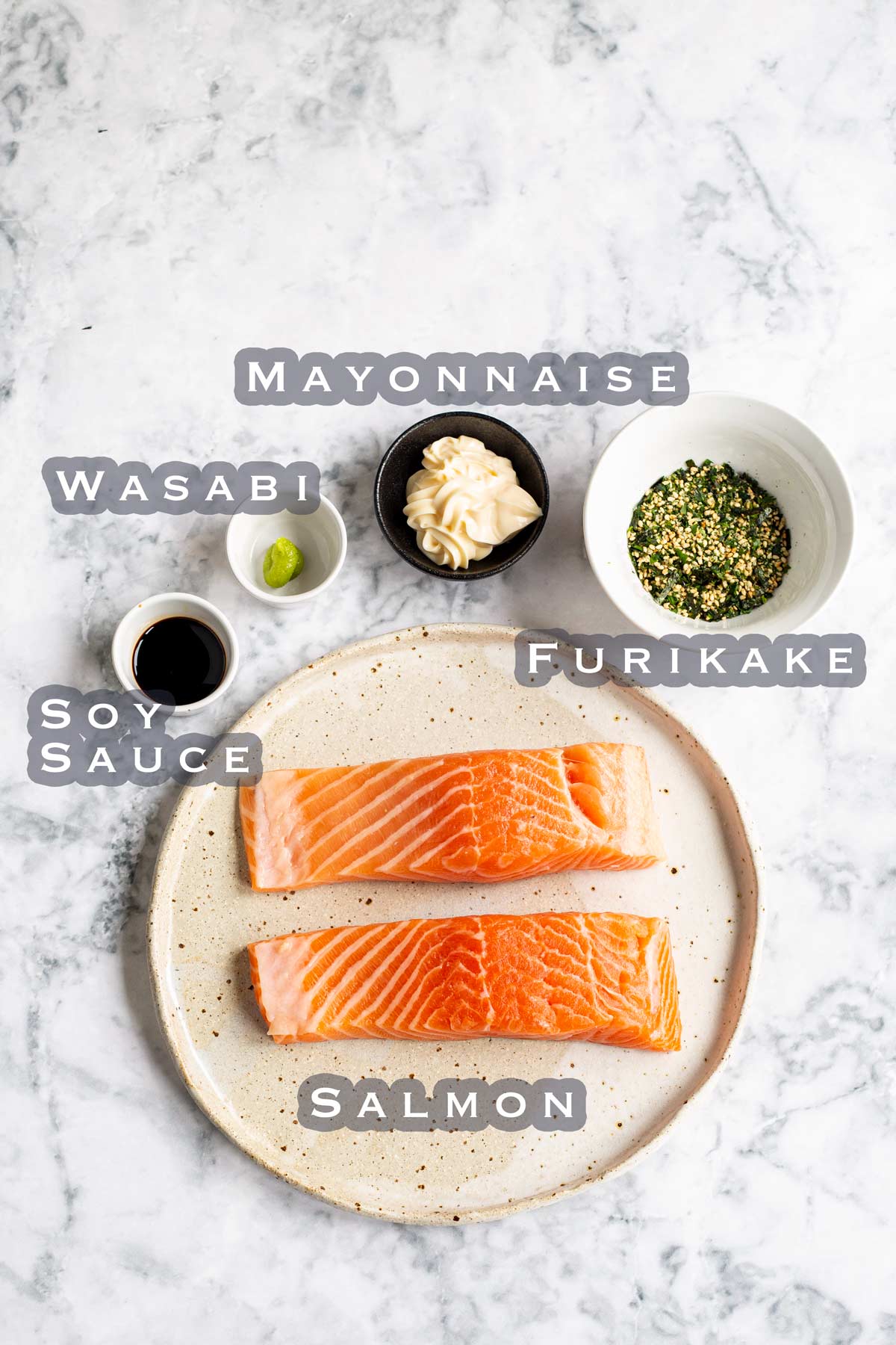 ingredients to make Furikake Salmon laid out on a marble bench