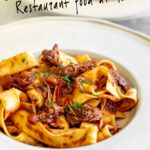 Pin Image: Lamb Ragu with pappardelle in a rustic bowl with text overlaid