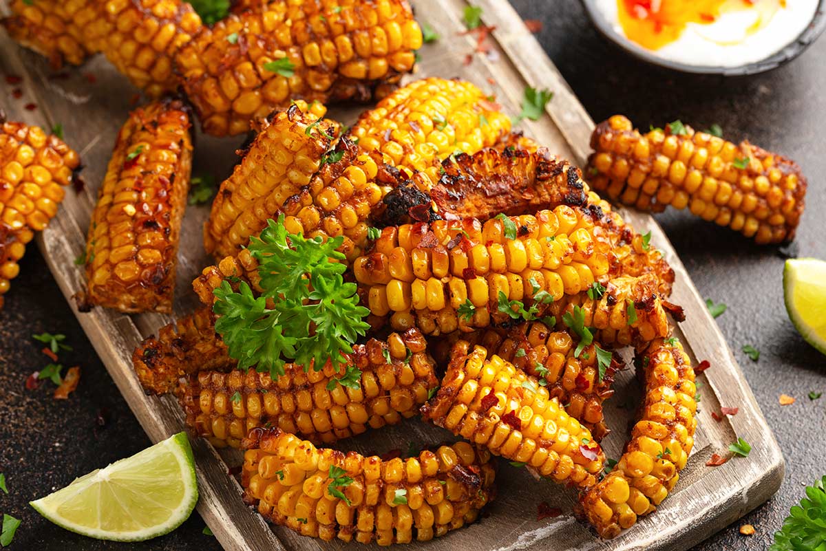 cooked strips of corn with a seasoning rub over them