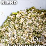 pin image: Dill Seasoning in a rustic white bowl with text overlaid