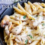 pin image: Skillet of cheesy chicken pasta with text overlaid