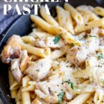 pin image: Skillet of cheesy chicken pasta with text overlaid