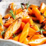 pin image: rosemary roasted carrots in a dish with text overlaid