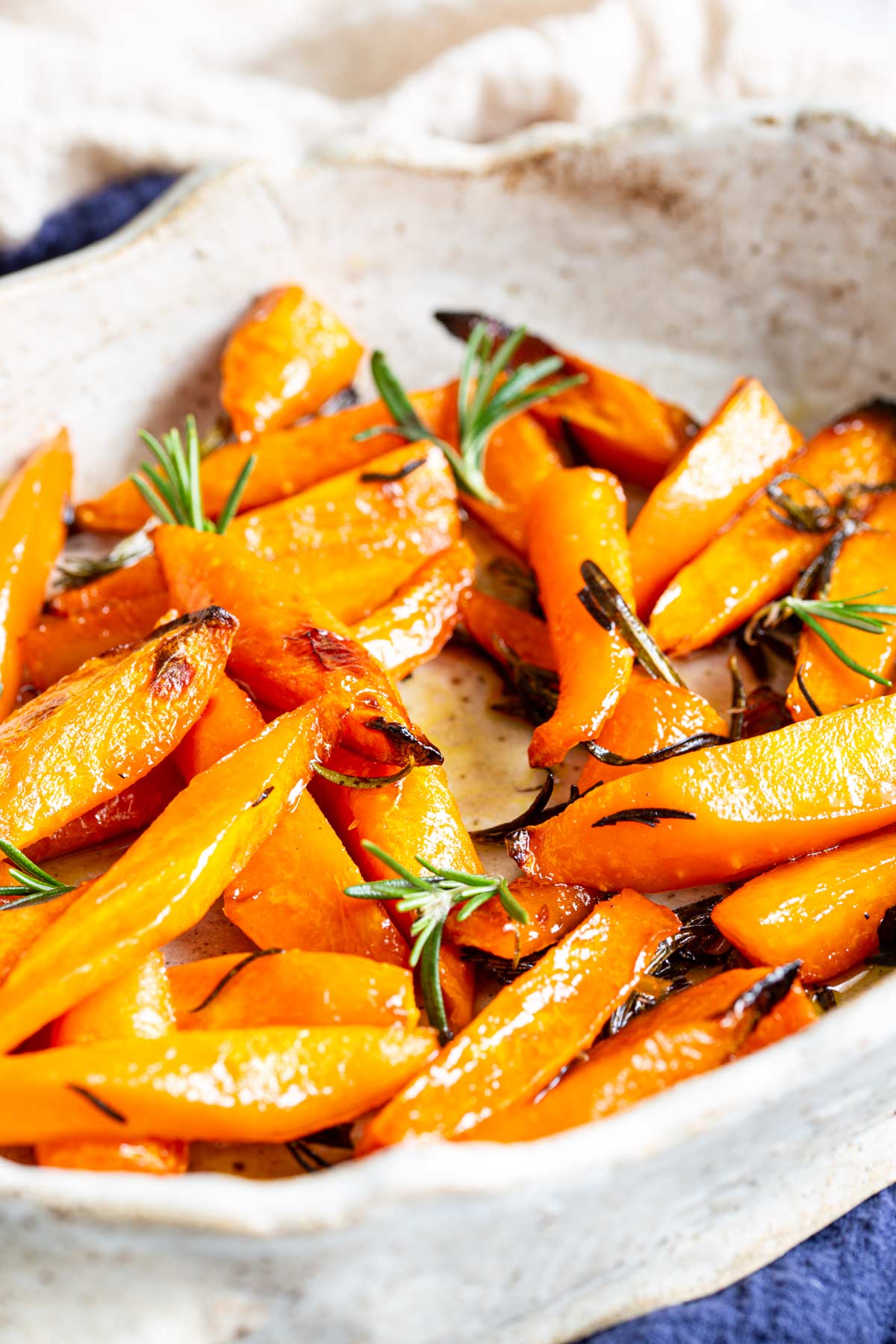 close up on chunks of carrots with crispy edges
