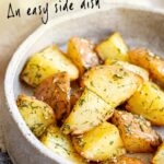 pin image: Dill potatoes in a rustic stoneware dish with text overlaid