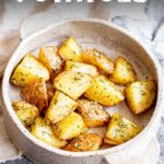 pin image: Dill potatoes in a rustic stoneware dish with text overlaid