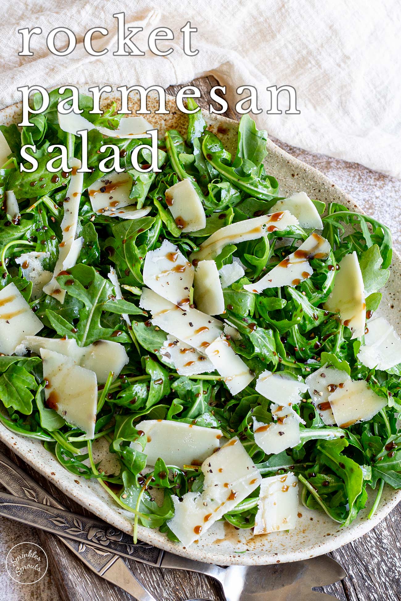 pin image: A rocket salad on a rustic plate with text overlaid