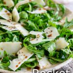 pin image: A rocket salad on a rustic plate with text overlaid