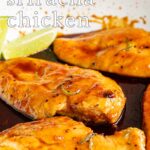 Pin Image: Honey Sriracha Chicken in a skillet with text overlaid