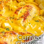 pin image: Curried chicken beasts in a skillet with text overlaid