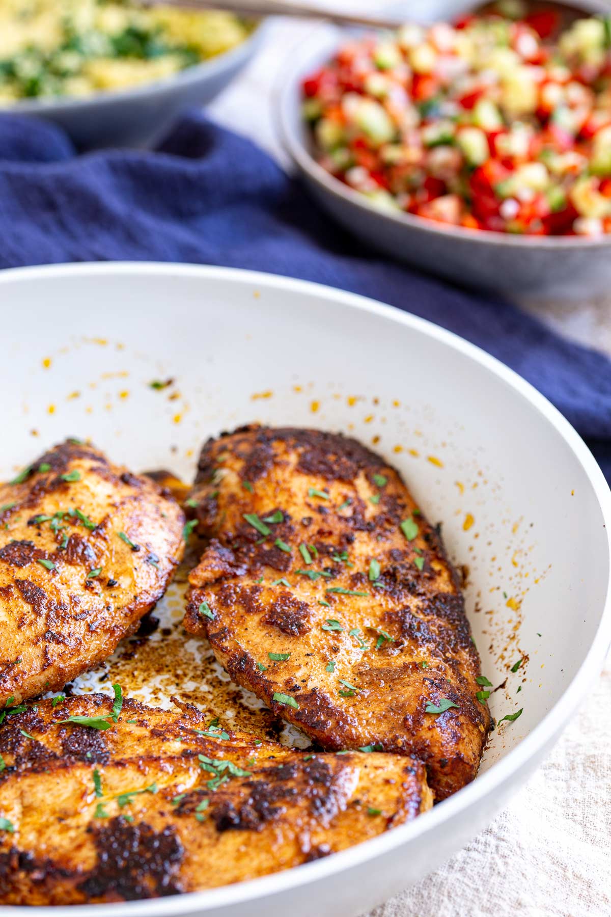 thin cooked chicken breasts coated with moroccan spices
