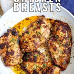 pin image: Moroccan chicken breasts in a skillet with text overlaid