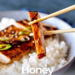 pin image: Chopsticks holding a slice of Honey Miso Chicken with text overlaid