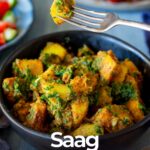 pin image: Saag aloo in a black bowl with text overlaid